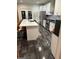 Modern kitchen with island and stainless steel appliances at 190 Oakwood Lakes Dr, Hampton, GA 30228