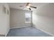 Simple bedroom with ceiling fan and carpet at 2171 Grant Ave, Mcdonough, GA 30252