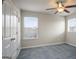 Spacious bedroom with double doors and window at 2171 Grant Ave, Mcdonough, GA 30252