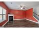 Living room with corner fireplace and hardwood floors at 2171 Grant Ave, Mcdonough, GA 30252