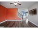 Living room with hardwood floors and staircase at 2171 Grant Ave, Mcdonough, GA 30252