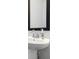 Clean bathroom with pedestal sink and modern faucet at 295 Cobalt Dr, Fayetteville, GA 30214