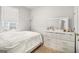Cozy bedroom with a dresser and large window allowing in natural light at 295 Cobalt Dr, Fayetteville, GA 30214