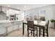 Spacious kitchen with white cabinets and quartz countertops at 295 Cobalt Dr, Fayetteville, GA 30214