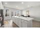Open concept kitchen with large island and breakfast nook at 295 Cobalt Dr, Fayetteville, GA 30214