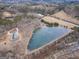 Breathtaking aerial view of the home, lake, and surrounding landscape, highlighting the property's tranquility at 3505 Gum Creek Rd, Oxford, GA 30054