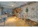 Unfinished basement with exposed concrete block walls and shelves for storage at 3505 Gum Creek Rd, Oxford, GA 30054