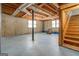 Unfinished basement with blue painted flooring and exposed ductwork at 3505 Gum Creek Rd, Oxford, GA 30054
