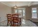 Dining room features natural light from bay windows, providing views of the surrounding landscape at 3505 Gum Creek Rd, Oxford, GA 30054