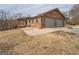Charming brick home with a two-car garage, covered porch, and well-maintained yard at 3505 Gum Creek Rd, Oxford, GA 30054