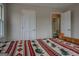 Spacious main bedroom with an en-suite bathroom, large windows, and a comfy bed at 3505 Gum Creek Rd, Oxford, GA 30054