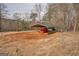 A large metal storage structure protects machinery on this expansive property at 3505 Gum Creek Rd, Oxford, GA 30054