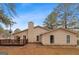 Back of home and deck offer a great entertaining space at 210 Imad Ct, Fairburn, GA 30213
