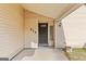 A close-up of the home's front door with visible house number at 210 Imad Ct, Fairburn, GA 30213