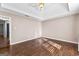 Bright bedroom featuring hardwood floors and an open layout at 110 Bailey Ct, Fayetteville, GA 30215