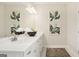 Double vanity bathroom with modern fixtures and decor at 10462 Trellis Lane (Lot 41), Hampton, GA 30228