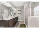 Bathroom with double vanity and large walk-in shower at 10462 Trellis Lane (Lot 41), Hampton, GA 30228
