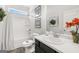 Clean bathroom with a bathtub, toilet, and vanity with a white countertop at 10462 Trellis Lane (Lot 41), Hampton, GA 30228