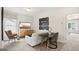 Versatile bonus room with TV and workspace at 10462 Trellis Lane (Lot 41), Hampton, GA 30228
