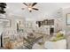 Open concept kitchen and living area with island seating at 10462 Trellis Lane (Lot 41), Hampton, GA 30228