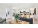 Open living room with kitchen views and access to patio at 10462 Trellis Lane (Lot 41), Hampton, GA 30228