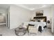 Bright main bedroom with sitting area and ensuite bath at 10462 Trellis Lane (Lot 41), Hampton, GA 30228
