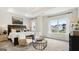 Spacious main bedroom with large windows and sitting area at 10462 Trellis Lane (Lot 41), Hampton, GA 30228