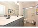 Modern bathroom with double vanity and bathtub at 1480 Trellis Court (Lot 42), Hampton, GA 30228