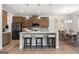 Modern kitchen with an island and stainless steel appliances at 1480 Trellis Court (Lot 42), Hampton, GA 30228