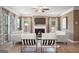 Cozy living room featuring a fireplace and ample natural light at 1480 Trellis Court (Lot 42), Hampton, GA 30228