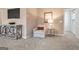 Cozy sitting area featuring a comfortable armchair and stylish decor at 1480 Trellis Court (Lot 42), Hampton, GA 30228
