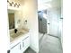 Stylish bathroom, featuring a walk-in shower and vanity at 1279 Allene Sw Ave, Atlanta, GA 30310