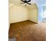 Large bedroom with brown carpet and ceiling fan at 1279 Allene Sw Ave, Atlanta, GA 30310