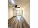 Bright bedroom featuring wood-look floors and ceiling fan at 1279 Allene Sw Ave, Atlanta, GA 30310