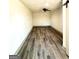 Spacious bonus room with wood-look flooring and ceiling fan at 1279 Allene Sw Ave, Atlanta, GA 30310