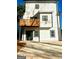 Rear view of two-story home, highlighting the deck and backyard at 1279 Allene Sw Ave, Atlanta, GA 30310
