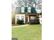Two-story Craftsman style home with white siding, dark trim, and a front porch at 1279 Allene Sw Ave, Atlanta, GA 30310