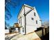 White two-story home with a side view showcasing a deck and backyard at 1279 Allene Sw Ave, Atlanta, GA 30310