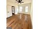 Bright living room featuring hardwood floors and a ceiling fan at 1279 Allene Sw Ave, Atlanta, GA 30310