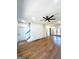 Spacious living room with hardwood floors, ceiling fan, and stairs to upper level at 1279 Allene Sw Ave, Atlanta, GA 30310