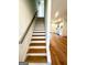 Elegant staircase leading to the upper level of the home at 1279 Allene Sw Ave, Atlanta, GA 30310