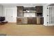 Finished basement with a wet bar and wine cooler at 500 Augusta Ln, Chattahoochee Hills, GA 30268