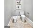 Powder room with toilet and bidet at 500 Augusta Ln, Chattahoochee Hills, GA 30268