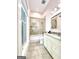 Bathroom with tub, shower, and vanity at 500 Augusta Ln, Chattahoochee Hills, GA 30268