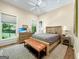 Bedroom with hardwood floors and a window view at 500 Augusta Ln, Chattahoochee Hills, GA 30268