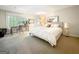 Spacious bedroom with large windows and ample natural light at 500 Augusta Ln, Chattahoochee Hills, GA 30268