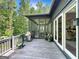 Spacious deck with screened porch and outdoor grill at 500 Augusta Ln, Chattahoochee Hills, GA 30268