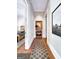 Elegant hallway with hardwood floors and artwork at 500 Augusta Ln, Chattahoochee Hills, GA 30268