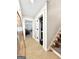 Hallway with carpet and access to other rooms at 500 Augusta Ln, Chattahoochee Hills, GA 30268