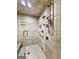 Multi-head shower with glass enclosure and tile surround at 500 Augusta Ln, Chattahoochee Hills, GA 30268